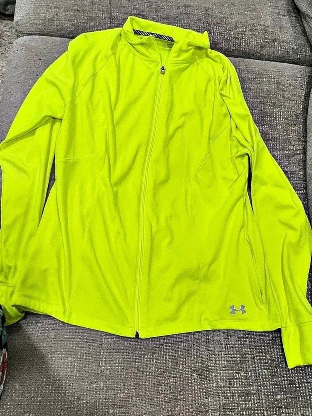 Under Armour women's neon yellow/chartreuse full-zip running windbreaker jacket